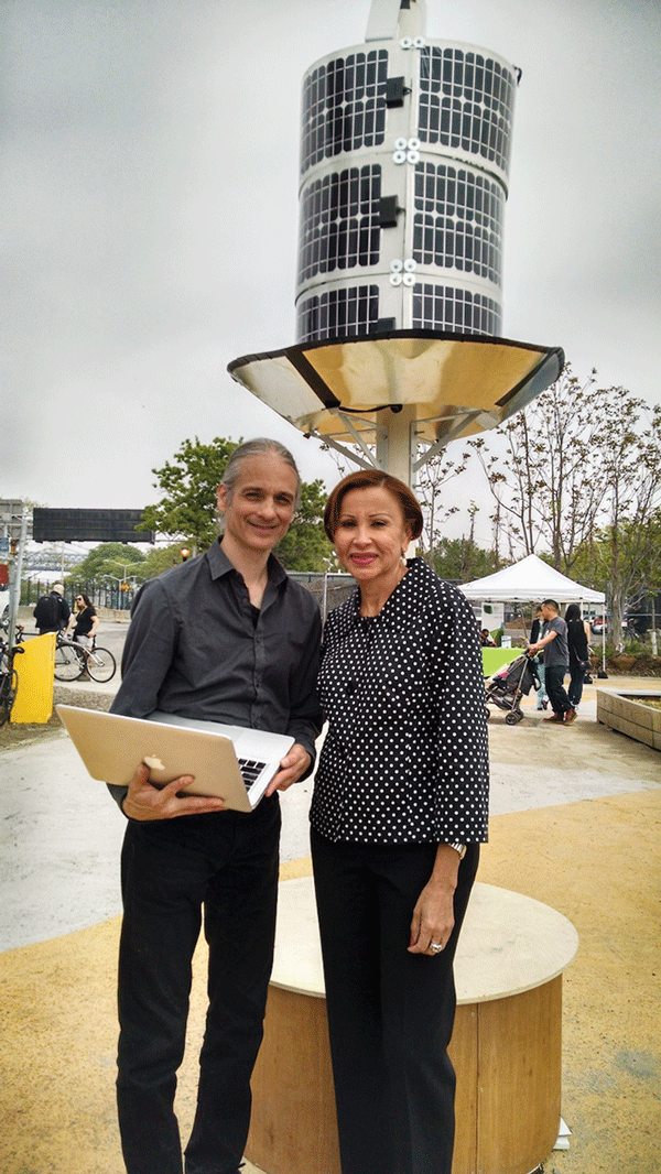 Paul Garrin with Congressmember Nydia Velazquez and the Lumen at the opening of the public space on Pier 42.
