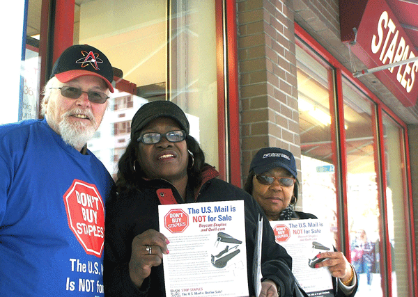 From left, John Dennie, Rosa Greene and Doris Leary decried the U.S. Postal Service’s putting postal counters in Staples stores.   Photo by Liza Béar