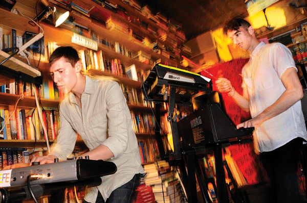 Jas Walton, left, and Miles Arntzen helped bring Eastern philosopher Alan Watts’s words to new life during a one-night-only performance at Unoppressive Non-Imperialist Bargain Books.   Photos by Bob Krasner