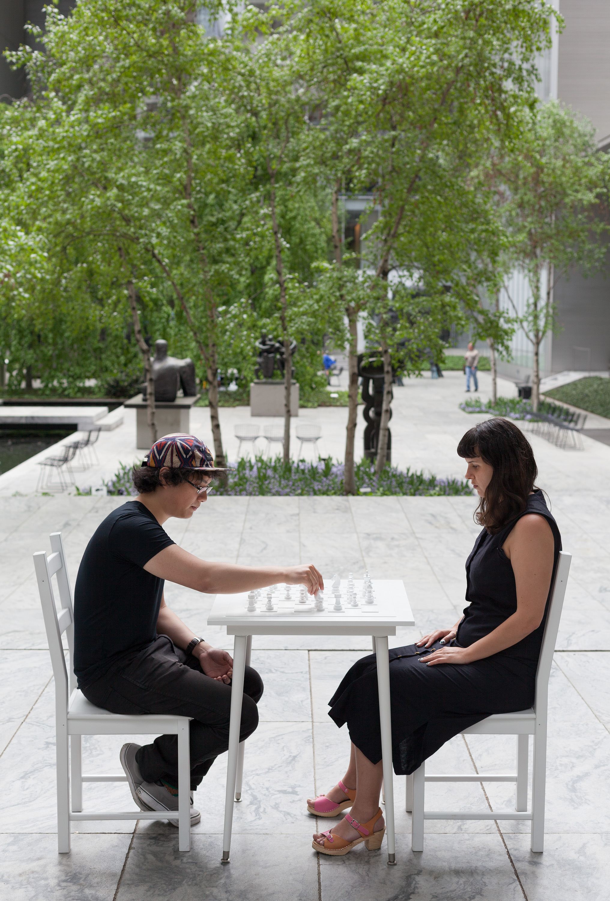 Buhmann on Art: Yoko Ono at MoMA 3 Yoko Ono’s “White Chess Set” (1966) in the Abby Aldrich Rockefeller Sculpture Garden, presented in conjunction with the exhibit. Photo by Thomas Griesel © 2015 The Museum of Modern Art.