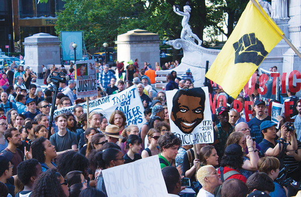 Amid signs of progress, #BlackLivesMatter still pushing for more reform 1 Marchers last Friday first gathered at Columbus Circle for speeches before heading down to Times Square and W. 34th St. PhotoS by Zach Williams