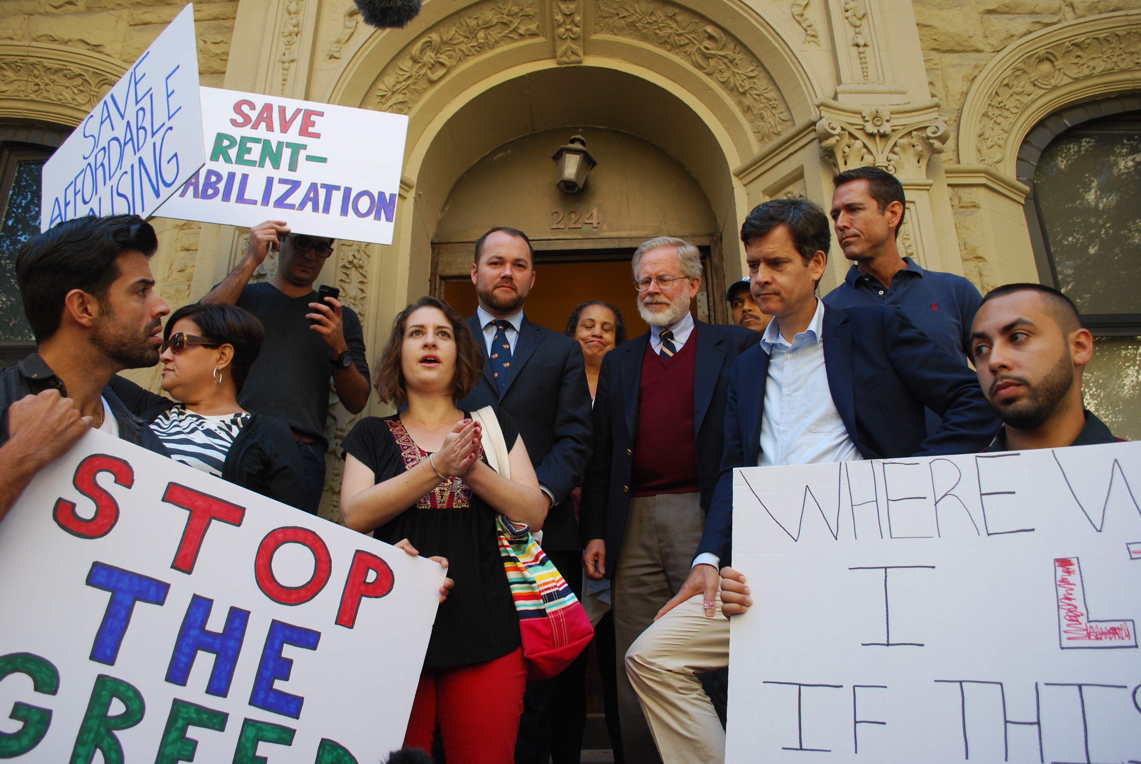 Momentum Building to Confront Construction Permit Fraud 1 L to R: In 2014, City Councilmember Corey Johnson, Assemblymember Richard Gottfried and State Senator Brad Hoylman speak out against the deplorable conditions at 222-224 W. 21 St. Photo by Winnie McCroy.
