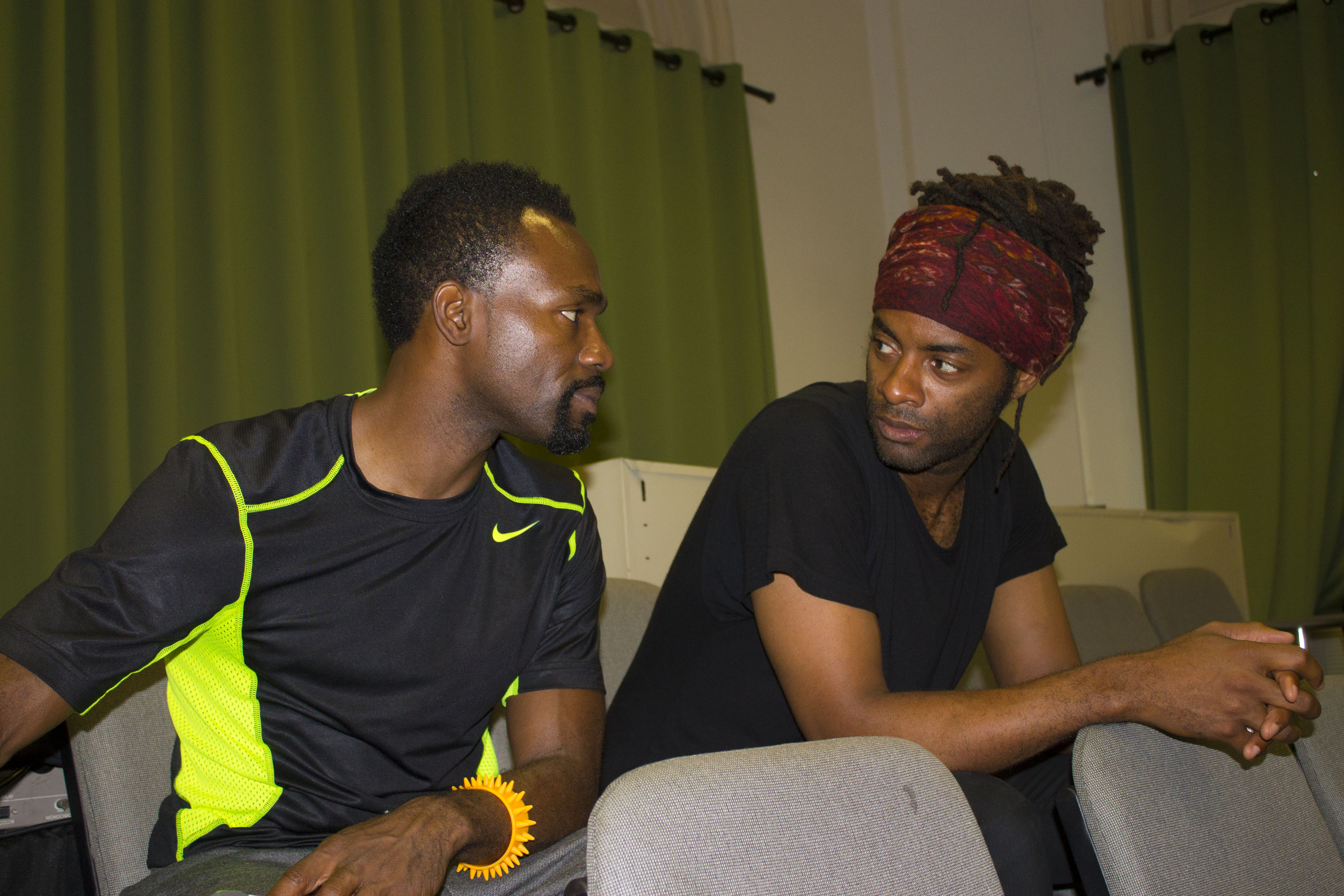 Diving deep into a gesture of dignity and pride 2 Choreographer André Zachery (left) and visual artist LaMont Hamilton address the history and implications of DAP, without overt demonstrations of the gesture. Photo by Zach Williams.