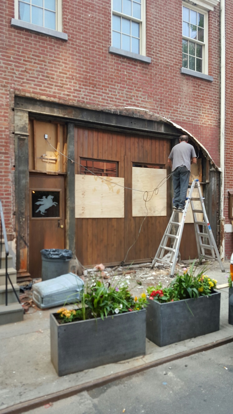 The facade of One if by Land, Two if by Sea after the stucco archway was removed.