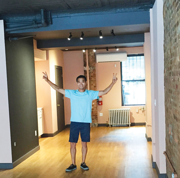 Co-owner Lobsang Tsultrim happily meditates on the store’s new space.   Photo courtesy East Village Cheese