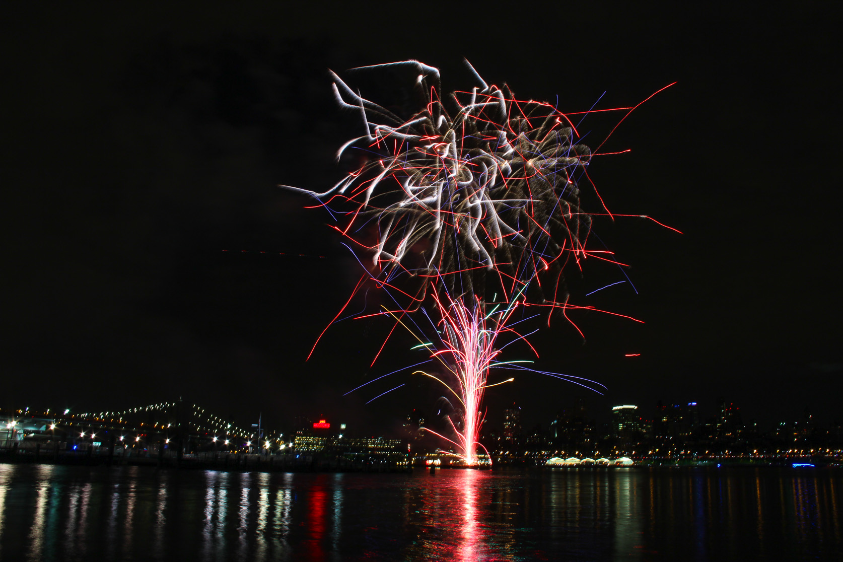 Some of the sights from last Saturday night. This year’s high-flying fireworks on the East River south of the Brooklyn Bridge were visible from many spots at street level in the East Village and Lower East Side. Photos by Tequila Minsky