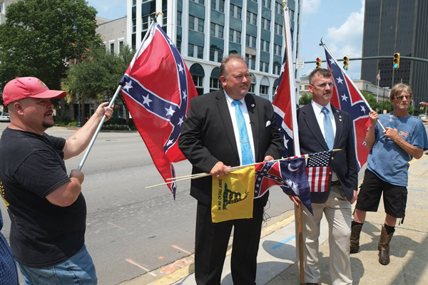 As MoveOn.org delivered petitions in Columbia, S.C., calling for the striking of the Confederate colors in all government places, pro-flag counterdemonstrators were joined by two members of the state Legislature.