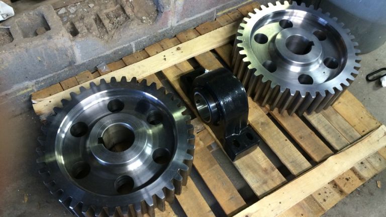 New gears custom manufactured for the Wonder Wheel sit on pallets in a workshop on July 20, 2015. The gears are expected to be installed after the summer season ends. 
