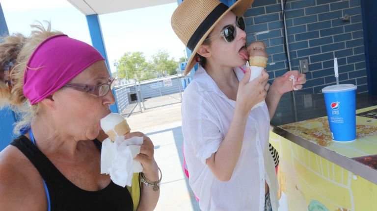 Diana Ame, left, and Grace Pilkati, her niece, visiting from Philadelphia, have ice cream on the FDR boardwalk in Dongan Hills, Staten Island, on Saturday, July 25, 2015.