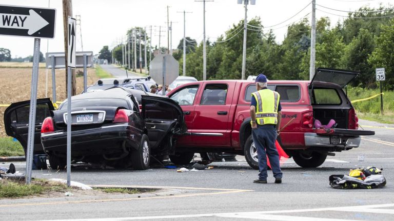 The scene on Route 48 and Depot Lane in Cutchogue, where a first responder said there were reports that a crash between a limousine and a pickup truck resulted in multiple fatalities on Saturday, July 18, 2015.