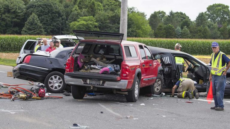 The scene on Route 48 and Depot Lane in Cutchogue, where a first responder said there were reports that a crash between a limousine and a pickup truck resulted in multiple fatalities on Saturday, July 18, 2015.