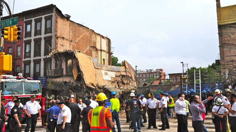 A four-story building at 1438 Fulton St. in the Bed-Stuy section of Brooklyn, collapsed just before 2:30 p.m. on Tuesday, July 14, 2014. The FDNY says three people were treated for non-life-threatening injuries.