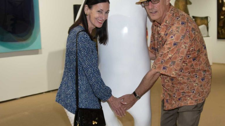 Amy Rosi and Peter Rosenthal get a feel for the art at Art Southampton at Nova's Ark on July 10, 2015 in Water Mill.