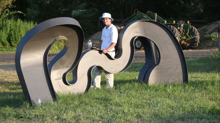 Zach Snitofsky becomes a part of the art at Art Southampton at Nova's Ark on July 10, 2015 in Water Mill.