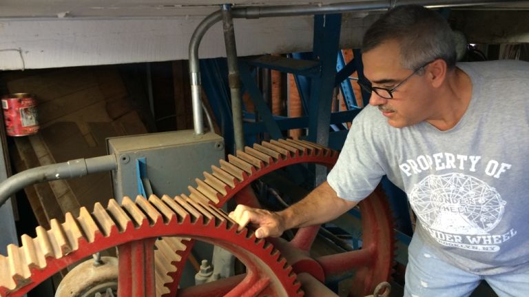 Steve Vourderis, one of the brothers who co-owns the Wonder Wheel at Coney Island, inspects gears that help rotate the ride, on July 20, 2015. 