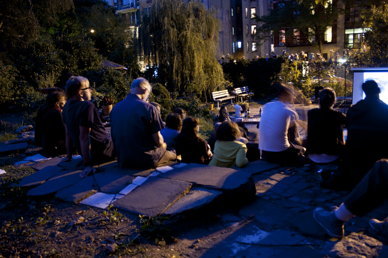 Watching a film in La Plaza Cultural at last year's MoRUS Film Fest.