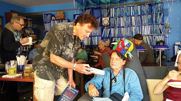 Gary Null giving Jean-Louise Bourgeois a gift of some natural toothpaste and a book on reversing arthritis at Bourgeois’s birthday party this past July. Null also gave the West Village activist and scion of sculptor Louise Bourgeois some of his other books and DVD’s on health and current affairs.  Villager file photo