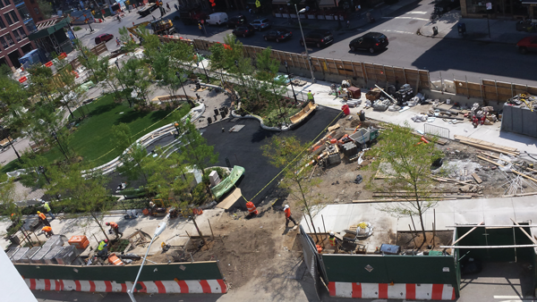 Downtown Express photos by Lincoln Anderson An overview shot of the new park taken from a W. 12th St. balcony of Lenox Health Greenwich Village, above. Work being done on the emerging park viewed from the corner of W. 12th St. and Seventh Ave. South, at right 