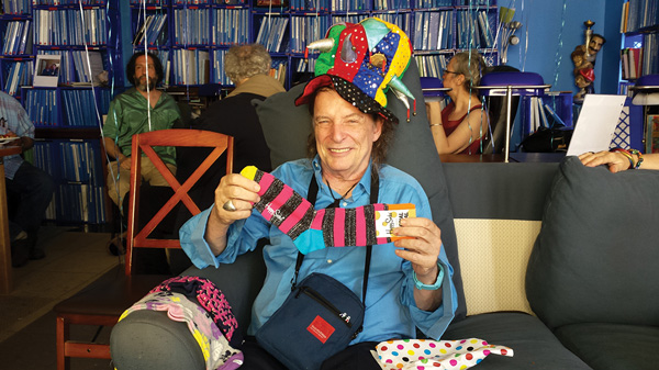 J.L.B. enjoys a gift of some colorful socks. He’s certainly no heel, but he really liked these ones because they sported a touch of his favorite color, blue.   Photos by Scoopy