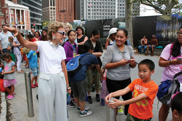 Merry raves flow for fish carousel opening 3 Warrie Price, president of The Battery Conservancy.