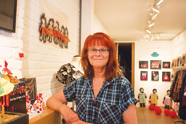 Linda St. John in her pop-up shop and show at Umbrella Arts Gallery.   Photos by Cody Brooks