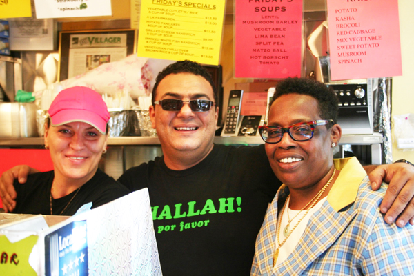 B&H owner Fawzy Abdelwahed with his wife, Ola, left, and Bernadette Nation from the Department of Small Business Services, who has been helping the restaurant obtain permits and navigate through complicated agency bureaucracy.