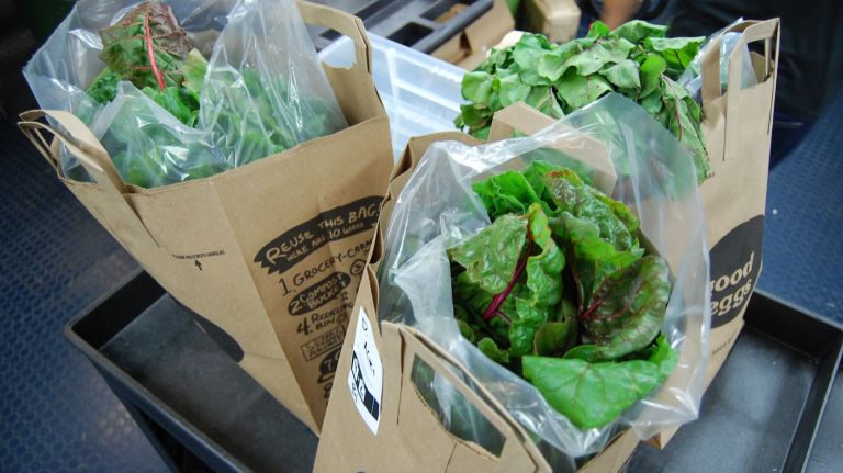 Chard is loaded up in delivery bags at Good Eggs in September 2014. 