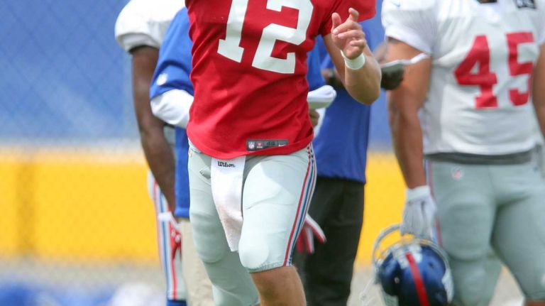New York Giants quarterback Ryan Nassib drops back to pass during training camp at the Quest Diagnostics Training Center in East Rutherford, N.J., on Saturday, Aug. 8, 2015.
