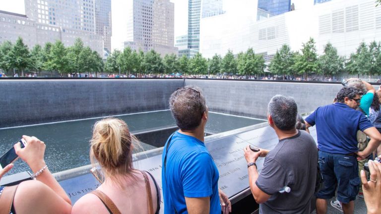 People visit the 9/11 memorial and museum in Manhattan's Financial District on Aug. 20, 2015.