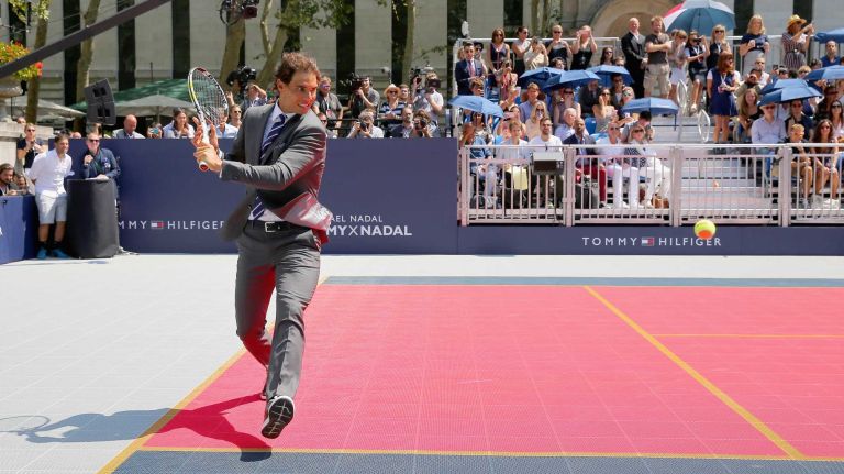 NEW YORK, NY - AUGUST 25: Rafael Nadal plays tennis at the Tommy Hilfiger and Rafael Nadal Global Brand Ambassadorship Launch at Bryant Park on August 25, 2015 in New York City. (Photo by Mike Stobe/Getty Images for Tommy Hilfiger)