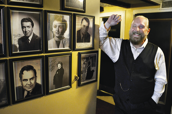 Lorcan Otway reminiscing with memorabilia of his father, Howard Otway, at Theatre 80.    Photo by Bob Krasner