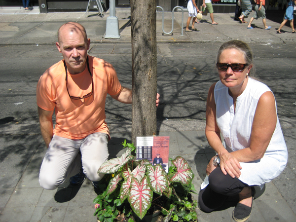 Robert and Nancy Larson with the memorial to their son, Kyle, on Union Square West.  Photo by DUSICA SUE MALESEVIC