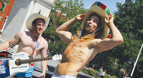 Naked Cowboy lets it all hang out in Wash Sq. 2 Photos by Tequila Minsky