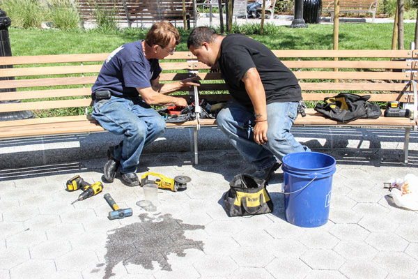 Hospital triangle goes ‘back to the land’ as new park opens; AIDS memorial is coming next 3 Workers were still putting finishing touches on the park last Friday.