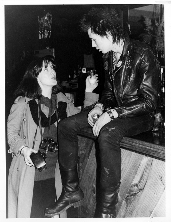 Roberta Bayley with the Sex Pistols’ Sid Vicious, during the sound check before the Pistols’ Dallas show, when she was the photographer for Punk magazine. Her pug Sidney was actually named after Sidney Falco, Tony Curtis’s character in “Sweet Smell of Success.” But “depending on who asked,” she would sometimes say it was for Sid Vicious.  Photo by Godlis