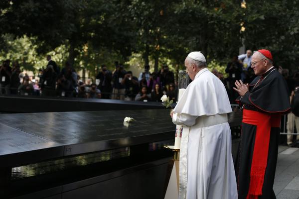 Many thousands flocked to see Pope Francis 1 Photo by National September11 Memorial & Museum Pope Francis and Cardinal Timothy Dolan, archbishop of New York, at the 9/11 Memorial Sept. 25, 2015.