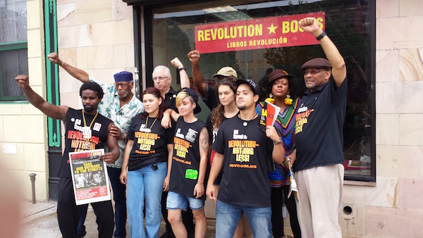 Revolution Books is Re-Opening in Harlem 1 In front of the new Revolution Books.