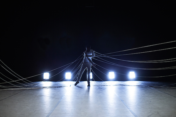 Spring forward to fall festivals 9 Iranian artist Ali Moino makes tension tangible, in his Crossing the Line festival performance. Photo by Mathilde Delahaye.