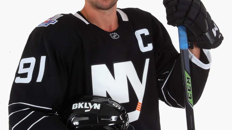 John Tavares #91 of the New York Islanders models the team's third uniform during a photo session on Sept. 15, 2015 at Iceworks in Syosset.