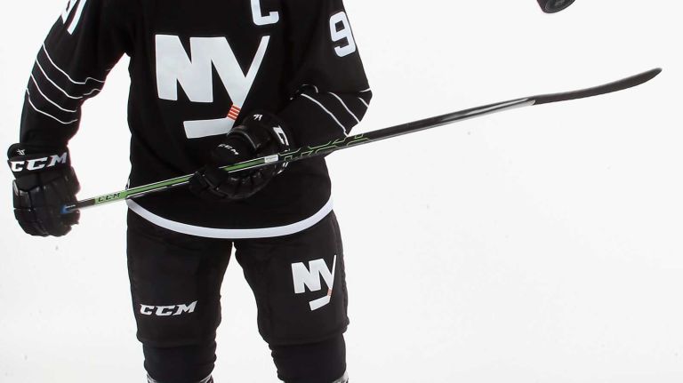 John Tavares #91 of the New York Islanders models the team's third uniform during a photo session on Sept. 15, 2015 at Iceworks in Syosset.