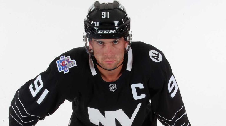John Tavares #91 of the New York Islanders models the team's third uniform during a photo session on Sept. 15, 2015 at Iceworks in Syosset.