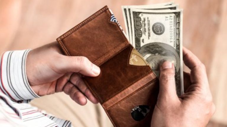 If your manager isn't licensed in any way, it's illegal for him to attempt to collect a fee.