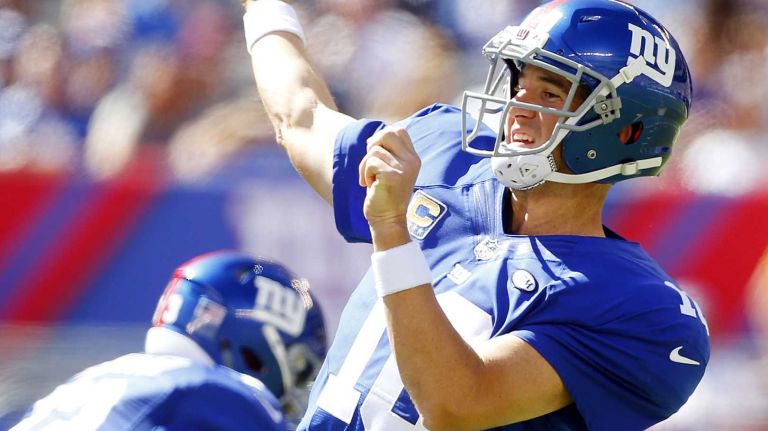 Eli Manning #10 of the New York Giants throws a pass in the first half against the Atlanta Falcons during an NFL game at MetLife Stadium on Sunday, Sept. 20, 2015.