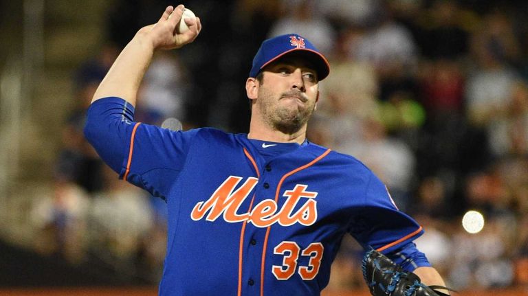 Subway Series: Yankees vs. Mets 58 New York Mets starting pitcher Matt Harvey delivers a pitch against the New York Yankees during the first inning of a baseball game at Citi Field on Sunday, Sept. 20, 2015.