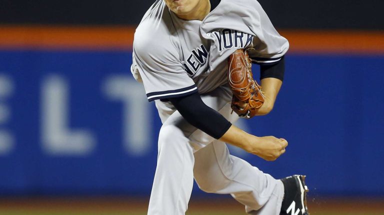 Subway Series: Yankees vs. Mets 100 Masahiro Tanaka of the New York Yankees pitches in the third inning against the New York Mets at Citi Field on Friday, Sept. 18, 2015.