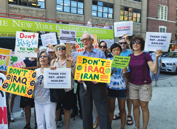 Nadler hears it from both sides Dueling rallies near the federal building at 201 Varick St. last Friday supported and protested Congressmember Jerrold Nadler’s position on the Iran nuclear weapons deal. Older demonstrators, some of them Holocaust survivors, called on the West Side representative to buck the president’s plan, saying it poses a threat to both Israel and America. Others from MoveOn.org and other progressive groups, above, turned out to support the pact.    Photo by Tequila Minsky Dueling rallies near the federal building at 201 Varick St. last Friday supported and protested Congressmember Jerrold Nadler’s position on the Iran nuclear weapons deal. Older demonstrators, some of them Holocaust survivors, called on the West Side representative to buck the president’s plan, saying it poses a threat to both Israel and America. Others from MoveOn.org and other progressive groups, above, turned out to support the pact.