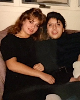 The writer, left, with a friend, back in their black clothes-wearing days in high school.