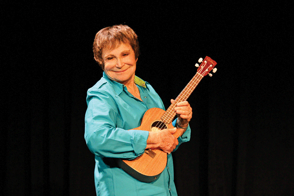 Ukulele lady D’yan Forest didn’t let a morning radiation treatment stop her from driving to a gig on Staten Island.  Photo by Stephen Greving