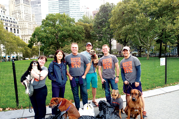 Photo by Downtown Dog NYC. Members of Downtown Dog NYC at a cleanup event in the Battery. 