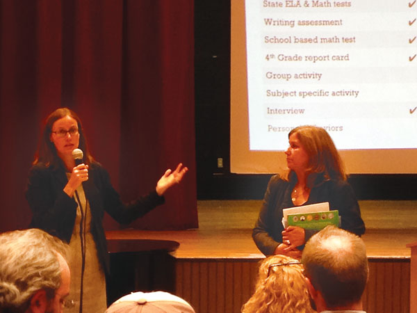 Sara McPhee, from the D.O.E. Office of Student Enrollment, left, and Bonnie Laboy, superintendent of School District 2, at the Oct. 20 meeting on admissions at 75 Morton St.  Photo by Sara Hendrickson